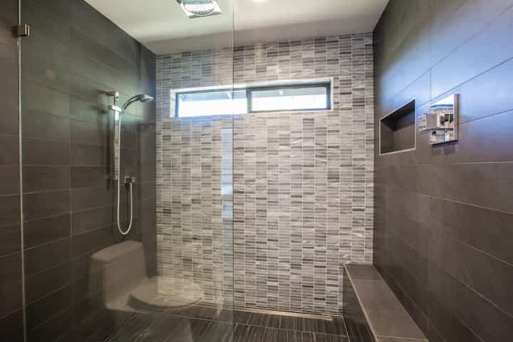 Patterned bathroom tile has been installed in the bathroom of Boulder, Colorado home